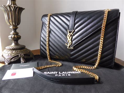 black ysl bag with black chain|ysl black quilted bag.